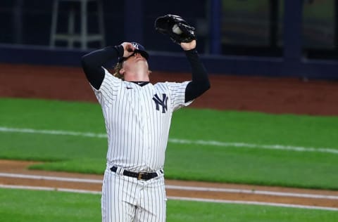 NEW YORK, NEW YORK - APRIL 16: Nick Nelson #79 of the New York Yankees reacts in the first inning against the Tampa Bay Rays at Yankee Stadium on April 16, 2021 in New York City. (Photo by Mike Stobe/Getty Images)