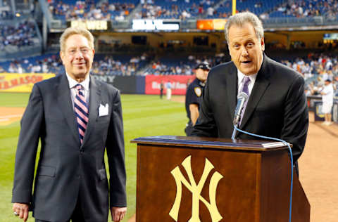 NEW YORK, NY - SEPTEMBER 20: (NEW YORK DAILIES OUT) New York Yankees broadcasters Michael Kay (R) and John Sterling participate during pre game ceremonies prior to a game against the San Francisco Giants at Yankee Stadium on September 20, 2013 in the Bronx borough of New York City. The Yankees defeated the Giants 5-1. (Photo by Jim McIsaac/Getty Images)