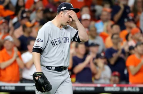 HOUSTON, TEXAS - OCTOBER 19: Zack Britton #53 of the New York Yankees reacts against the Houston Astros during the eighth inning in game six of the American League Championship Series at Minute Maid Park on October 19, 2019 in Houston, Texas. (Photo by Elsa/Getty Images)