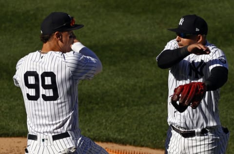 NEW YORK, NY - MAY 1: Aaron Judge #99 of the New York Yankees celebrates with Rougned Odor #18 of the New York Yankees after defeating the Detroit Tigers at Yankee Stadium on May 1, 2021 in the Bronx borough of New York City. The Yankees won 6-4. (Photo by Adam Hunger/Getty Images)