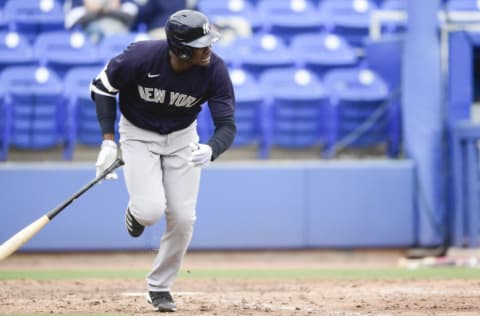 DUNEDIN, FLORIDA - MARCH 21: Estevan Florial #90 of the New York Yankees runs to first base during the ninth inning against the Toronto Blue Jays during a spring training game at TD Ballpark on March 21, 2021 in Dunedin, Florida. (Photo by Douglas P. DeFelice/Getty Images)