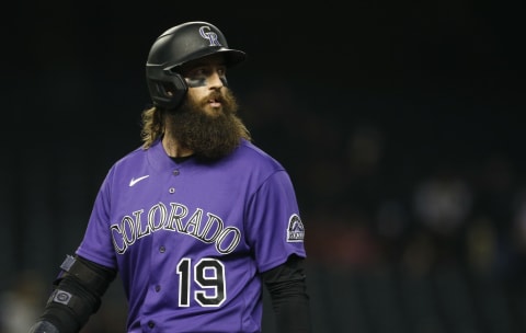 PHOENIX, ARIZONA – APRIL 30: Charlie Blackmon #19 of the Colorado Rockies walks back to the dugout after flying out to left field against the Arizona Diamondbacks during the eighth inning of the MLB game at Chase Field on April 30, 2021 in Phoenix, Arizona. (Photo by Ralph Freso/Getty Images)