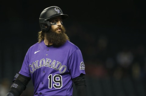 PHOENIX, ARIZONA - APRIL 30: Charlie Blackmon #19 of the Colorado Rockies walks back to the dugout after flying out to left field against the Arizona Diamondbacks during the eighth inning of the MLB game at Chase Field on April 30, 2021 in Phoenix, Arizona. (Photo by Ralph Freso/Getty Images)