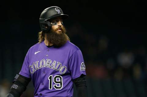 PHOENIX, ARIZONA - APRIL 30: Charlie Blackmon #19 of the Colorado Rockies walks back to the dugout after flying out to left field against the Arizona Diamondbacks during the eighth inning of the MLB game at Chase Field on April 30, 2021 in Phoenix, Arizona. (Photo by Ralph Freso/Getty Images)