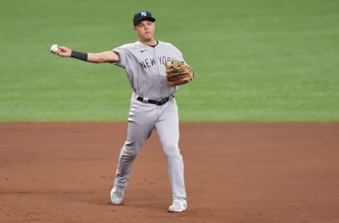 ST PETERSBURG, FLORIDA - MAY 11: Gio Urshela #29 of the New York Yankees fields a ground ball during the seventh inning against the Tampa Bay Rays at Tropicana Field on May 11, 2021 in St Petersburg, Florida. (Photo by Douglas P. DeFelice/Getty Images)