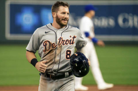 KANSAS CITY, MO - MAY 21: Robbie Grossman #8 of the Detroit Tigers walks back to the dugout after being tagged out by Whit Merrifield #15 of the Kansas City Royals in the 4th inning at Kauffman Stadium on May 21, 2021 in Kansas City, Missouri. (Photo by Kyle Rivas/Getty Images)