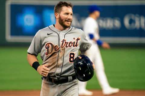 KANSAS CITY, MO - MAY 21: Robbie Grossman #8 of the Detroit Tigers walks back to the dugout after being tagged out by Whit Merrifield #15 of the Kansas City Royals in the 4th inning at Kauffman Stadium on May 21, 2021 in Kansas City, Missouri. (Photo by Kyle Rivas/Getty Images)