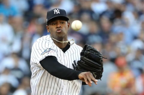 NEW YORK, NEW YORK - OCTOBER 15: Luis Severino #40 of the New York Yankees tries to pick off Jose Altuve #27 of the Houston Astros (not pictured) during the second inning in game three of the American League Championship Series at Yankee Stadium on October 15, 2019 in New York City. (Photo by Elsa/Getty Images)