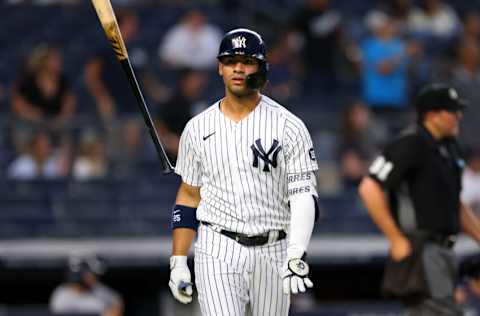 NEW YORK, NY - JUNE 05: Gleyber Torres #25 of the New York Yankees flips his bat after he hit a two-run home run against the Boston Red Sox during the fourth inning of a game at Yankee Stadium on June 5, 2021 in New York City. (Photo by Rich Schultz/Getty Images)