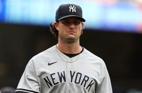 MINNEAPOLIS, MN - JUNE 9: Gerrit Cole #45 of the New York Yankees walks to the dugout before the start of the game against the Minnesota Twins at Target Field on June 9, 2021 in Minneapolis, Minnesota. (Photo by David Berding/Getty Images)