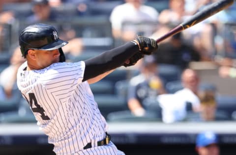 NEW YORK, NY - JUNE 24: Gary Sanchez #24 of the New York Yankees hits a three-run home run against the Kansas City Royals during the sixth inning of a game at Yankee Stadium on June 24, 2021 in New York City. (Photo by Rich Schultz/Getty Images)