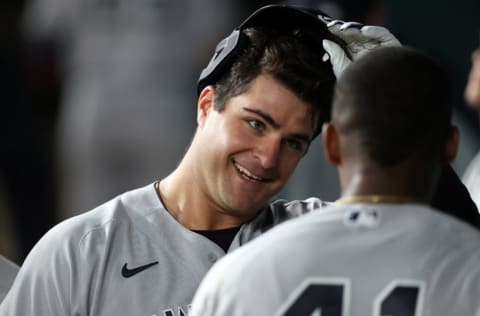 ARLINGTON, TEXAS - MAY 18: Mike Ford #36 and Miguel Andujar #41 of the New York Yankees celebrate after scoring against the Texas Rangers in the fourth inning at Globe Life Field on May 18, 2021 in Arlington, Texas. (Photo by Ronald Martinez/Getty Images)