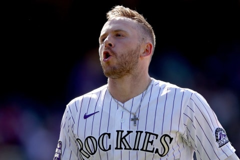 DENVER, COLORADO – MAY 23: Trevor Story #27 of the Colorado Rockies celebrates after hitting a walk off home run against the Arizona Diamondbacks in the ninth inning at Coors Field on May 23, 2021 in Denver, Colorado. (Photo by Matthew Stockman/Getty Images)