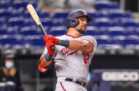 MIAMI, FLORIDA - JUNE 25: Kyle Schwarber #12 of the Washington Nationals watches his a solo home run land in the upper deck during the third inning against the Miami Marlins at loanDepot park on June 25, 2021 in Miami, Florida. (Photo by Mark Brown/Getty Images)