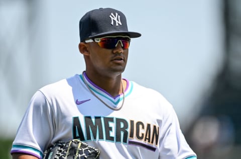 DENVER, CO - JULY 11: Jasson Dominguez #25 of American League Futures Team walks on there field as players warm up before a game against the National League Futures Team at Coors Field on July 11, 2021 in Denver, Colorado.(Photo by Dustin Bradford/Getty Images)