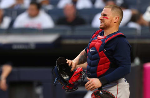 NEW YORK, NY - JULY 18: Catcher Christian Vázquez #7 of the Boston Red Sox grimaces after being hit by a foul ball in the second inning against the New York Yankees at Yankee Stadium on July 18, 2021 in New York City. The Yankees defeated the Red Sox 9-1. (Photo by Rich Schultz/Getty Images)