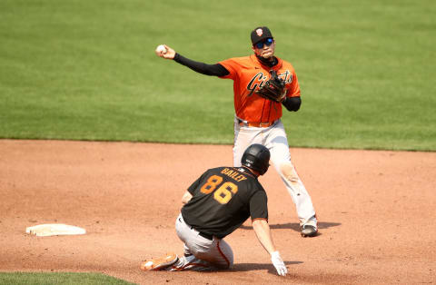 Wilmer Flores #41 of the San Francisco Giants attempts to turn a double play as Patrick Bailey #86 slides in to second base at Oracle Park on July 15, 2020 in San Francisco, California. (Photo by Ezra Shaw/Getty Images)