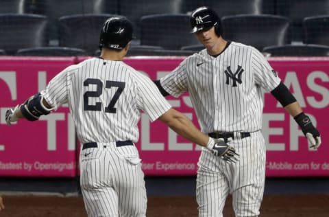 NEW YORK, NEW YORK - MAY 05: (NEW YORK DAILIES OUT) Giancarlo Stanton #27 of the New York Yankees celebrates his third inning two run home run against the Houston Astros with teammate DJ LeMahieu #26 at Yankee Stadium on May 05, 2021 in New York City. The Yankees defeated the Astros 6-3. (Photo by Jim McIsaac/Getty Images)