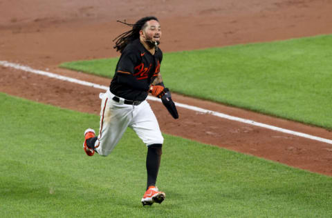 BALTIMORE, MARYLAND - JUNE 18: Freddy Galvis #2 of the Baltimore Orioles comes into score against the Toronto Blue Jays in the eighth inning at Oriole Park at Camden Yards on June 18, 2021 in Baltimore, Maryland. (Photo by Rob Carr/Getty Images)