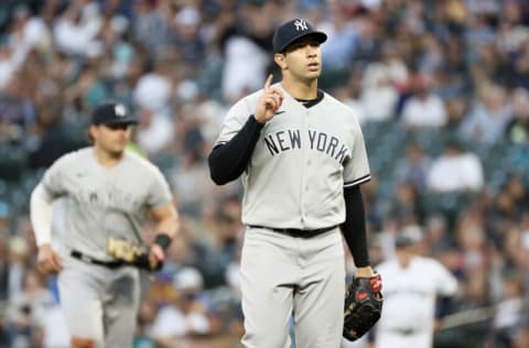 SEATTLE, WASHINGTON - JULY 07: Luis Cessa #85 of the New York Yankees reacts after the fourth inning against the Seattle Mariners at T-Mobile Park on July 07, 2021 in Seattle, Washington. (Photo by Steph Chambers/Getty Images)