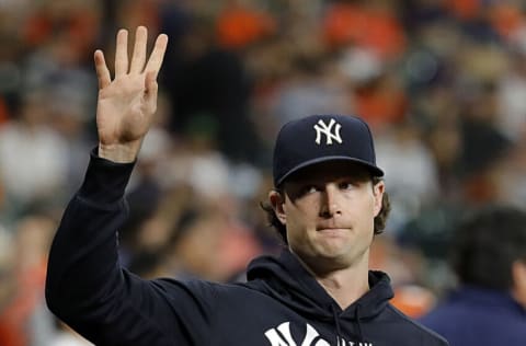 HOUSTON, TEXAS - JULY 09: Gerrit Cole #45 of the New York Yankees acknowledges the fans as he makes his first appearance since leaving the team at Minute Maid Park on July 09, 2021 in Houston, Texas. (Photo by Bob Levey/Getty Images)