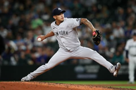 SEATTLE - JULY 7: Jonathan Loaisiga #43 of the New York Yankees pitches during the game against the Seattle Mariners at T-Mobile Park on July 7, 2021 in Seattle, Washington. The Yankees defeated the Mariners 5-4. (Photo by Rob Leiter/MLB Photos via Getty Images)