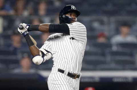 NEW YORK, NEW YORK - JULY 20: Estevan Florial #90 of the New York Yankees follows through on his eighth inning home run against the Philadelphia Phillies at Yankee Stadium on July 20, 2021 in New York City. The home run was the first in the major leagues for Florial. The Yankees defeated the Phillies 6-4. (Photo by Jim McIsaac/Getty Images)