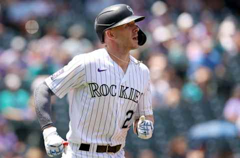 DENVER, COLORADO - JULY 21: Trevor Story #27 of the Colorado Rockies riuns to first after hitting a single against the Seattle Mariners in the first inning at Coors Field on July 21, 2021 in Denver, Colorado. (Photo by Matthew Stockman/Getty Images)