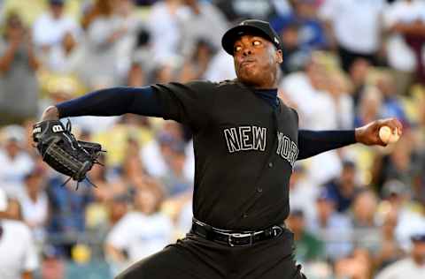 LOS ANGELES, CA - AUGUST 25: Aroldis Chapman #54 of the New York Yankees pitches in the ninth inning of the game against the Los Angeles Dodgers at Dodger Stadium on August 25, 2019 in Los Angeles, California. Teams are wearing special color schemed uniforms with players choosing nicknames to display for Players' Weekend. (Photo by Jayne Kamin-Oncea/Getty Images)