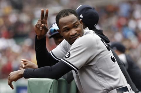 BOSTON, MA - JULY 25: Domingo German #55 of the New York Yankees waves to a fan from the dugout during the eighth inning against the Boston Red Sox at Fenway Park on July 25, 2021 in Boston, Massachusetts. (Photo By Winslow Townson/Getty Images)