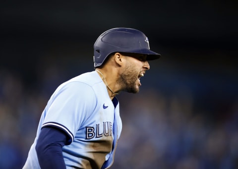 TORONTO, ON – AUGUST 08: George Springer #4 of the Toronto Blue Jays celebrates his 3-run game winning home run during the eighth inning during a MLB game against the Boston Red Sox at Rogers Centre on August 08, 2021 in Toronto, Canada. (Photo by Vaughn Ridley/Getty Images)