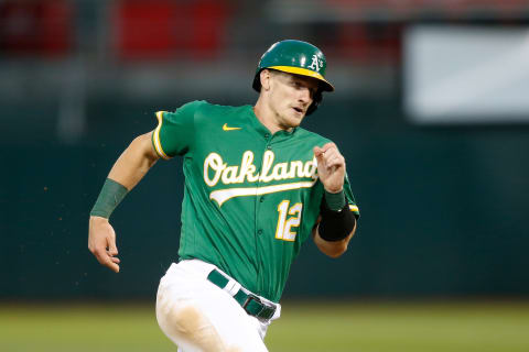 OAKLAND, CALIFORNIA – JUNE 14: Sean Murphy #12 of the Oakland Athletics rounds the base s against the Los Angeles Angels at RingCentral Coliseum on June 14, 2021 in Oakland, California. (Photo by Lachlan Cunningham/Getty Images)