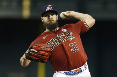 PHOENIX, ARIZONA - JULY 04: Starting pitcher Caleb Smith #31 of the Arizona Diamondbacks throws against the San Francisco Giants during the second inning of the MLB game at Chase Field on July 04, 2021 in Phoenix, Arizona. (Photo by Ralph Freso/Getty Images)