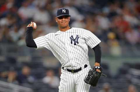 NEW YORK, NEW YORK - JUNE 29: Albert Abreu #84 of the New York Yankees throws to first during the ninth inning against the Los Angeles Angels at Yankee Stadium on June 29, 2021 in the Bronx borough of New York City. The Yankees won 11-5. (Photo by Sarah Stier/Getty Images)