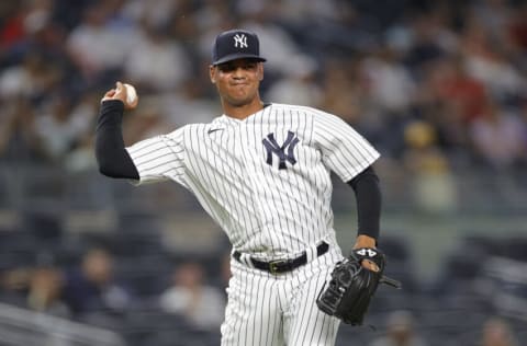 NEW YORK, NEW YORK - JUNE 29: Albert Abreu #84 of the New York Yankees throws to first during the ninth inning against the Los Angeles Angels at Yankee Stadium on June 29, 2021 in the Bronx borough of New York City. The Yankees won 11-5. (Photo by Sarah Stier/Getty Images)