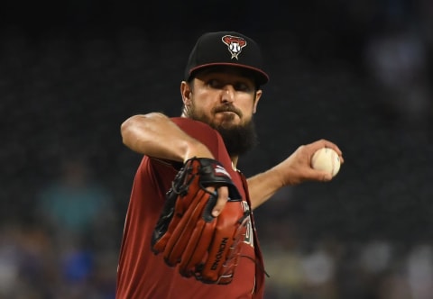 PHOENIX, ARIZONA – AUGUST 01: Caleb Smith #31 of the Arizona Diamondbacks delivers a pitch against the Los Angeles Dodgers at Chase Field on August 01, 2021 in Phoenix, Arizona. (Photo by Norm Hall/Getty Images)