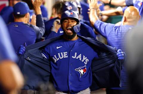 ANAHEIM, CALIFORNIA - AUGUST 11: Teoscar Hernandez #37 of the Toronto Blue Jays celebrates in the dugout after hitting a grand slam against the Los Angeles Angels during the fifth inning at Angel Stadium of Anaheim on August 11, 2021 in Anaheim, California. (Photo by Michael Owens/Getty Images)