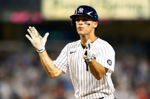 NEW YORK, NEW YORK - AUGUST 18: Andrew Velazquez #71 of the New York Yankees celebrates after hitting a RBI infield single in the second inning against the Boston Red Sox at Yankee Stadium on August 18, 2021 in New York City. (Photo by Mike Stobe/Getty Images)