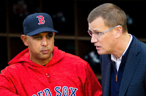 BOSTON, MA - APRIL 13: Red Sox CEO and president Sam Kennedy talks to manager Alex Cora #20 of the Boston Red Sox looks on before a game against the Baltimore Orioles at Fenway Park on April 13, 2018 in Boston, Massachusetts. (Photo by Adam Glanzman/Getty Images)