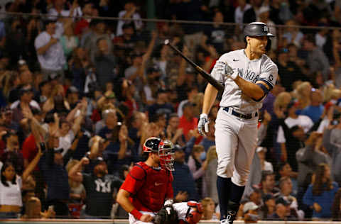 BOSTON, MA - SEPTEMBER 25: Giancarlo Stanton #27 of the New York Yankees connects for a grand slam home run against the Boston Red Sox in the eigth inning at Fenway Park on September 25, 2021 in Boston, Massachusetts. (Photo by Jim Rogash/Getty Images)