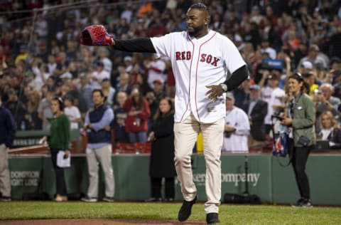 BOSTON, MA - SEPTEMBER 26: Former Boston Red Sox designated hitter David Ortiz is introduced before catching a ceremonial first pitch from the family of fallen Sergeant Johanny Rosario Pichardo before a game between the Boston Red Sox and the New York Yankees on September 26, 2021 at Fenway Park in Boston, Massachusetts. (Photo by Billie Weiss/Boston Red Sox/Getty Images)