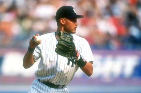 NEW YORK, NY - JUNE 16: Derek Jeter #2 of the New York Yankees fields a ground ball during a baseball game against the Cleveland Indians on June 16, 1996 at Yankee Stadium in New York City. (Photo by Mitchell Layton/Getty Images)