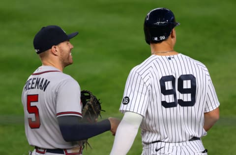 NEW YORK, NY - APRIL 20: Freddie Freeman #5 of the Atlanta Braves talks with Aaron Judge #99 of the New York Yankees during an MLB baseball game at Yankee Stadium on April 20, 2021 in New York City. The Yankees defeated the Braves 3-1. (Photo by Rich Schultz/Getty Images)