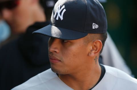 OAKLAND, CALIFORNIA - AUGUST 29: Jonathan Loaisiga #43 of the New York Yankees looks on during the game against the Oakland Athletics at RingCentral Coliseum on August 29, 2021 in Oakland, California. (Photo by Lachlan Cunningham/Getty Images)