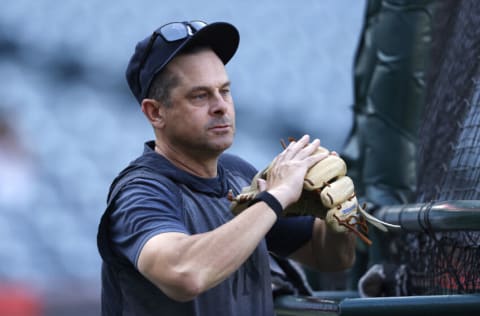 ANAHEIM, CALIFORNIA - AUGUST 30: Manager Aaron Boone of the New York Yankees looks on during batting practice prior to a game against the Los Angeles Angels at Angel Stadium of Anaheim on August 30, 2021 in Anaheim, California. (Photo by Sean M. Haffey/Getty Images)