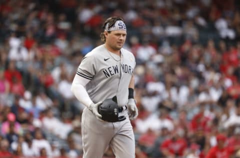 ANAHEIM, CALIFORNIA - SEPTEMBER 01: Luke Voit #59 of the New York Yankees walks to the first base against the Los Angeles Angels during the fifth inning at Angel Stadium of Anaheim on September 01, 2021 in Anaheim, California. (Photo by Michael Owens/Getty Images)