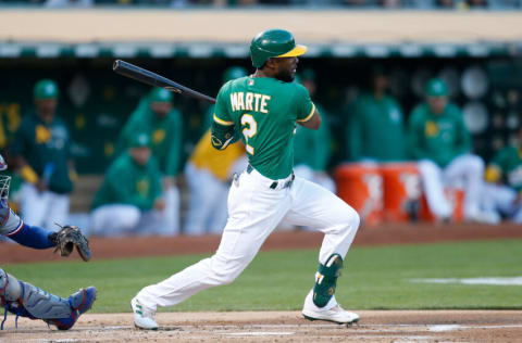 OAKLAND, CALIFORNIA - SEPTEMBER 10: Starling Marte #2 of the Oakland Athletics at bat against the Texas Rangers at RingCentral Coliseum on September 10, 2021 in Oakland, California. (Photo by Lachlan Cunningham/Getty Images)