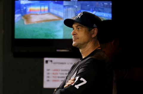 NEW YORK, NY - SEPTEMBER 12: Manager Aaron Boone #17 of the New York Yankees in action against the New York Mets during a game at Citi Field on September 12, 2021 in New York City. (Photo by Rich Schultz/Getty Images)