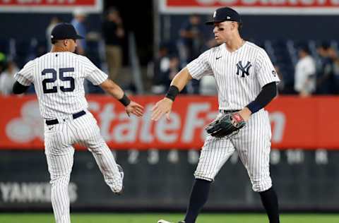 NEW YORK, NEW YORK - SEPTEMBER 20: Aaron Judge #99 and Gleyber Torres #25 of the New York Yankees celebrate after defeating the Texas Rangers at Yankee Stadium on September 20, 2021 in the Bronx borough of New York City. (Photo by Jim McIsaac/Getty Images)