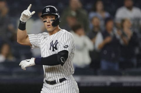 NEW YORK, NEW YORK - SEPTEMBER 21: Aaron Judge #99 of the New York Yankees reacts after hitting a three-run home run during the seventh inning against the Texas Rangers at Yankee Stadium on September 21, 2021 in the Bronx borough of New York City. (Photo by Sarah Stier/Getty Images)